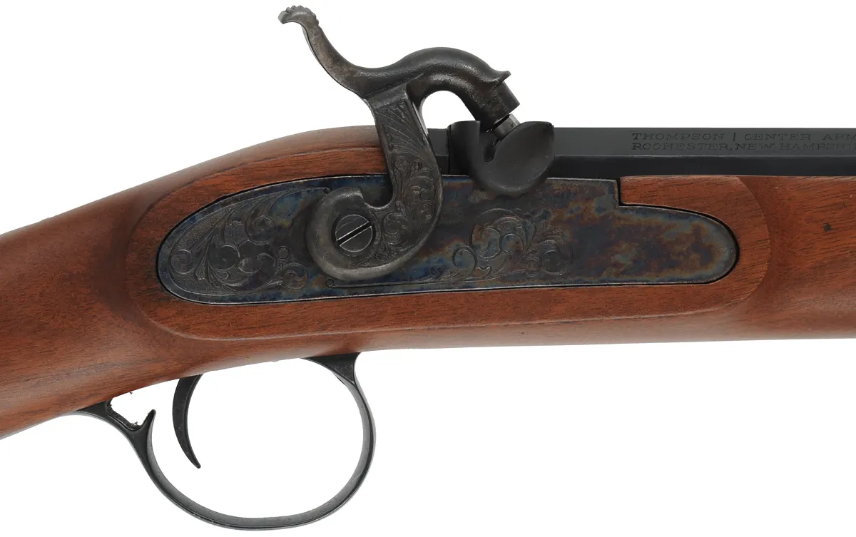 Thompson Center White Mountain Carbine,
.50 caliber, 28" T/C Hawken barrel,
figured walnut, blued, rubber recoil pad, sling studs, used