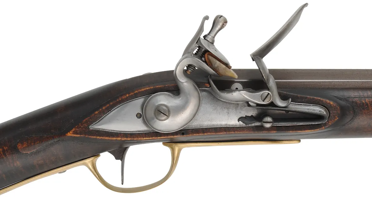 American Fowling Gun,
20 gauge, 44" octagon-to-round barrel,
Chambers' round faced English fowler flintlock,
dark stained maple, brass & iron trim,
used, signed by J. Alford