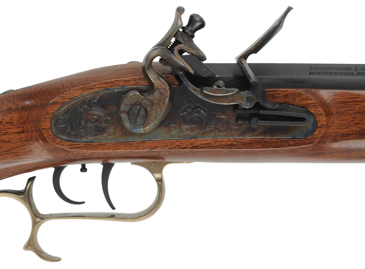 Thompson Center Hawken Rifle
.50 caliber, 28" barrel,
flintlock, walnut, brass, used