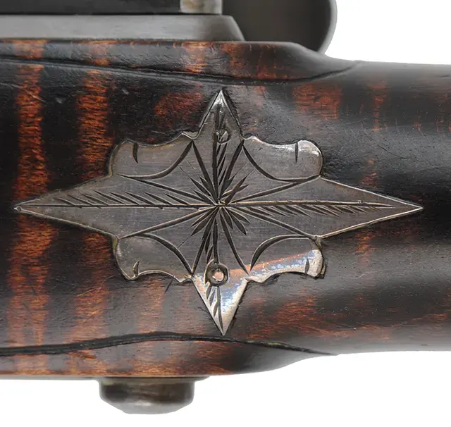 Kentucky Pistol,
.50 caliber 9-1/4" barrel,
small Siler flintlock, engraved brass, curly maple, 
used, by J. Kirklin