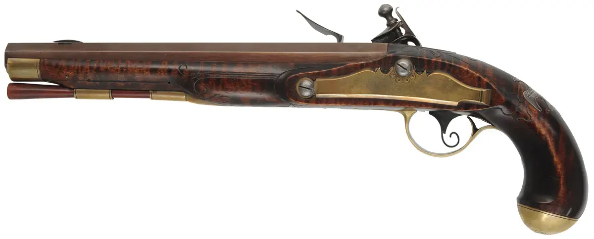 Kentucky Pistol,
.50 caliber 9-1/4" barrel,
small Siler flintlock, engraved brass, curly maple, 
used, by J. Kirklin