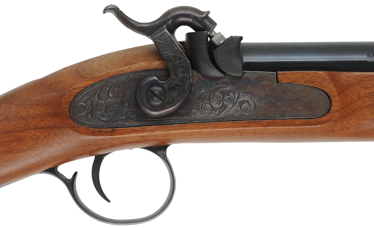 T/C New Englander Shotgun,
12 gauge screw-in chokes, 28" barrel,
percussion, walnut, iron trim, 
used, by Thompson Center Arms