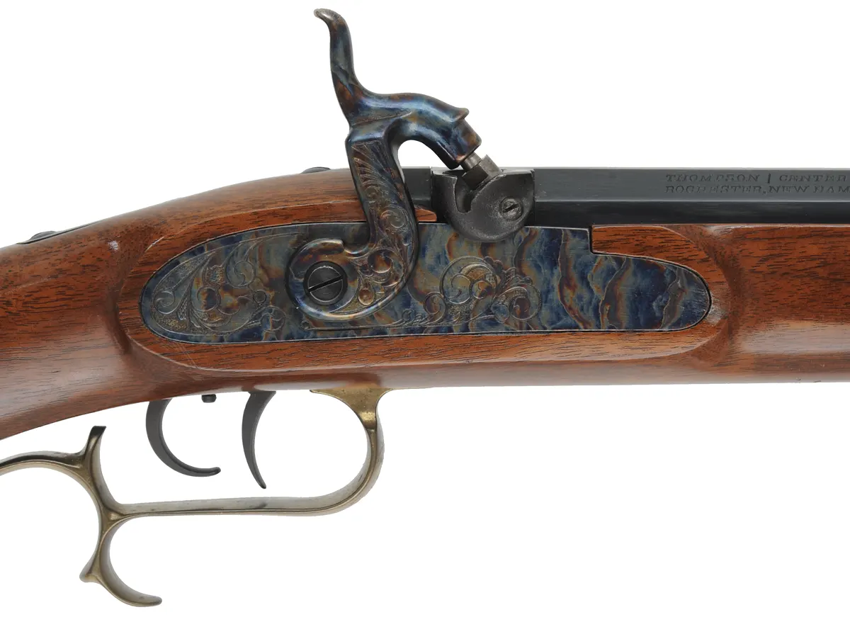 Thompson Center Hawken,
.50 caliber, 28" barrel,
percussion, walnut stock, brass trim, 
used, by Thompson Center Arms
