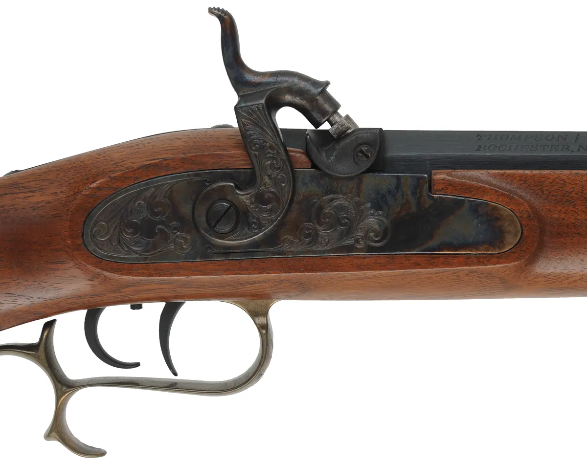 Thompson Center Hawken,
.45 caliber, 28" barrel,
percussion, walnut stock, brass trim, 
used, by Thompson Center Arms