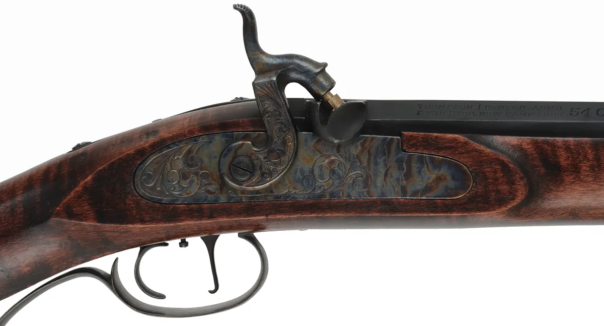 Hawken Rifle,
.54 caliber, 28" T/C barrel,
T/C percussion lock, maple, stock, 
iron trim, used