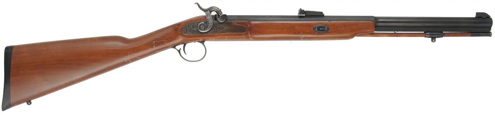 T/C White Mountain Carbine,
 .50 caliber, 21" octagon-to-round barrel, 
percussion, walnut, iron, 
used, with many handling marks in the stock