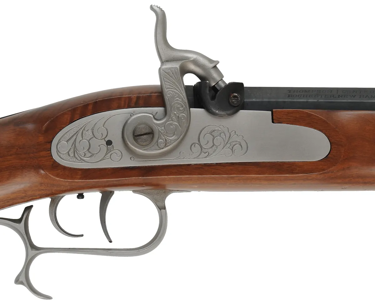 Thompson Center Hawken Cougar Rifle,
.50 caliber, 28" barrel,
percussion, fancy walnut stock, stainless steel trim,
used, by Thompson Center Arms