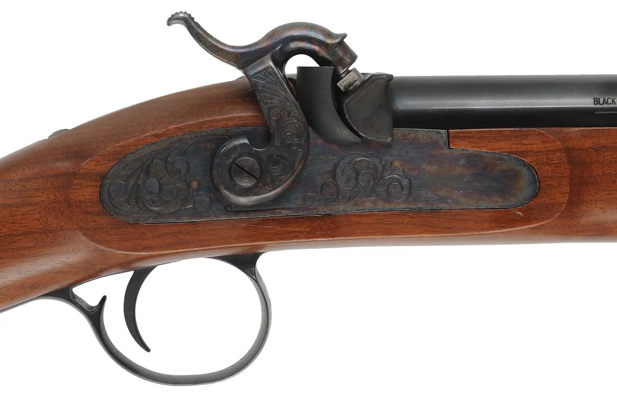 T/C New Englander Rifle,
.50 caliber, 26" barrel,
percussion, walnut, iron trim, 
used, by Thompson Center Arms