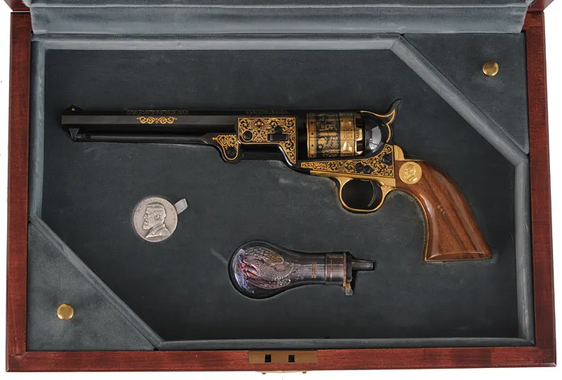 Robert E. Lee Commemorative 1851 Colt Navy ,
.36 caliber, 7 1/2" barrel,
high polish blue with inlaid gold, walnut, cased,
unfired, by United States Historical Society