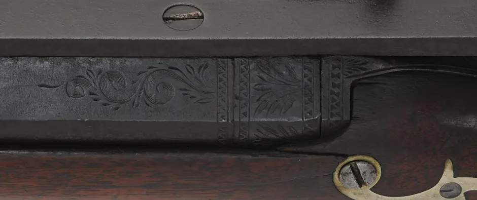 Antique Target Rifle
.48 caliber, 31" heavy barrel,
walnut stock, silver trim, peep sight, 
by A. Leonard, Saxon River, Vermont