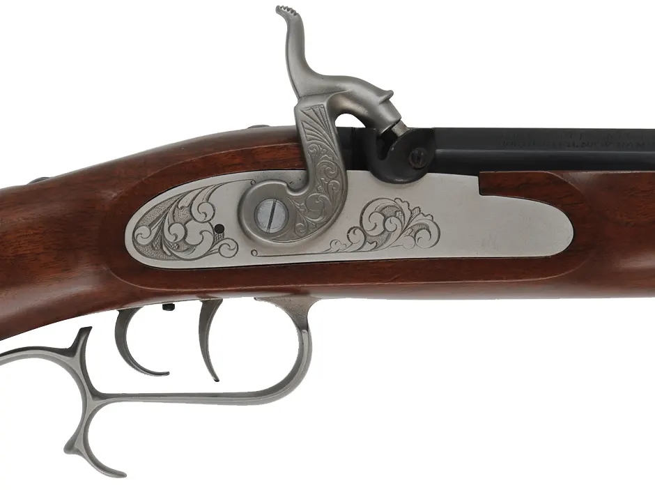 Thompson Center Hawken Cougar Rifle,
.50 caliber, 28" barrel,
percussion, fancy walnut, repaired crack at toe, stainless steel trim,
used, by Thompson Center Arms
