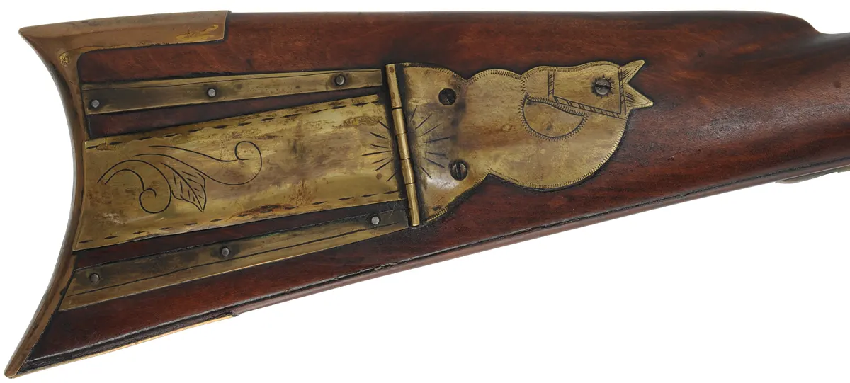 Tennessee Maid Longrifle,
.38 caliber, 38" barrel,
cherry, brass, percussion, 
by one of America's first replica longrifle makers
signed by Royland Southgate
