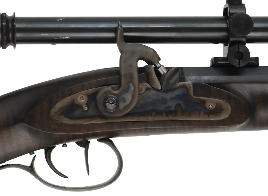 Hawken Squirrel Rifle,
.36 caliber 35" Rice barrel,
percussion, curly maple, iron trim,
6x Malcolm scope, used, by Brant Selb