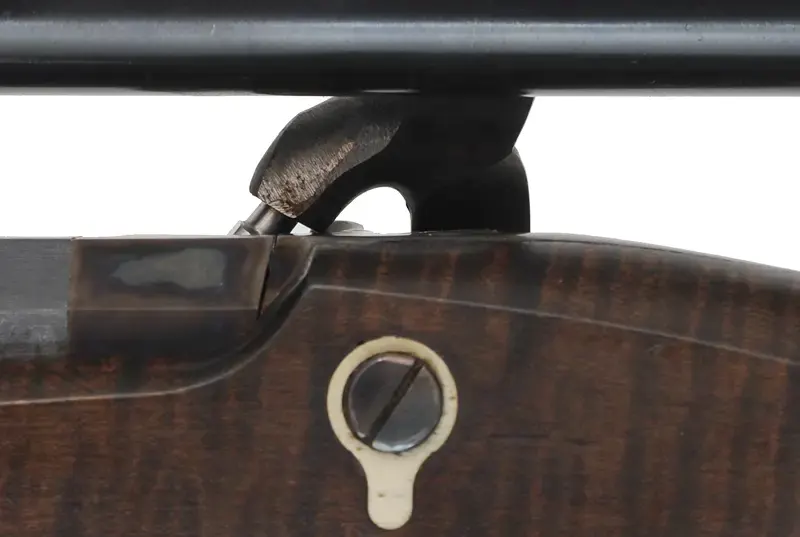 Hawken Squirrel Rifle,
.36 caliber 35" Rice barrel,
percussion, curly maple, iron trim,
6x Malcolm scope, used, by Brant Selb