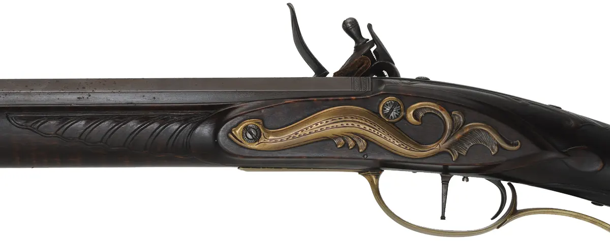 Lehigh Valley Longrifle,
.38 caliber, 40" barrel,
flintlock, curly maple, engraved brass,
with accouterments,
used, signed by F. Anderson Riley