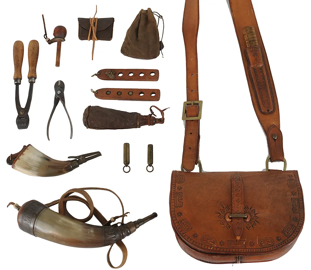 Lehigh Valley Longrifle,
.38 caliber, 40" barrel,
flintlock, curly maple, engraved brass,
with accouterments,
used, signed by F. Anderson Riley