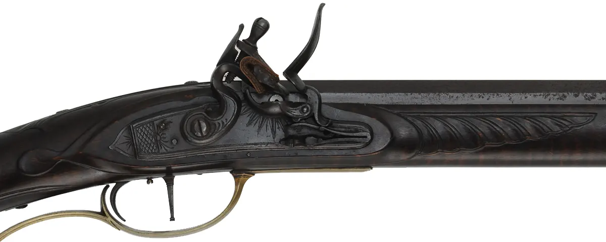 Lehigh Valley Longrifle,
.38 caliber, 40" barrel,
flintlock, curly maple, engraved brass,
with accouterments,
used, signed by F. Anderson Riley