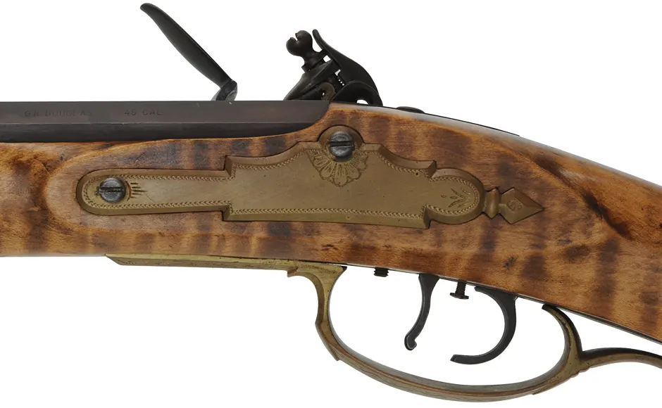Pennsylvania Longrifle, 
.45 caliber, 42" G.R. Douglas barrel,
curly maple, brass, engraved, flintlock, 
signed by Louis Smith of Johnson City, Tennessee