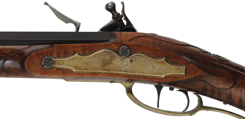 Fine Lancaster County, Pennsylvania Longrifle,
.40 caliber, 42" Green Mountain swamped barrel, 
large Siler flintlock, curly maple, brass trim,
raised carving, engraved patchbox, signed by contemporary builder R. Dietz