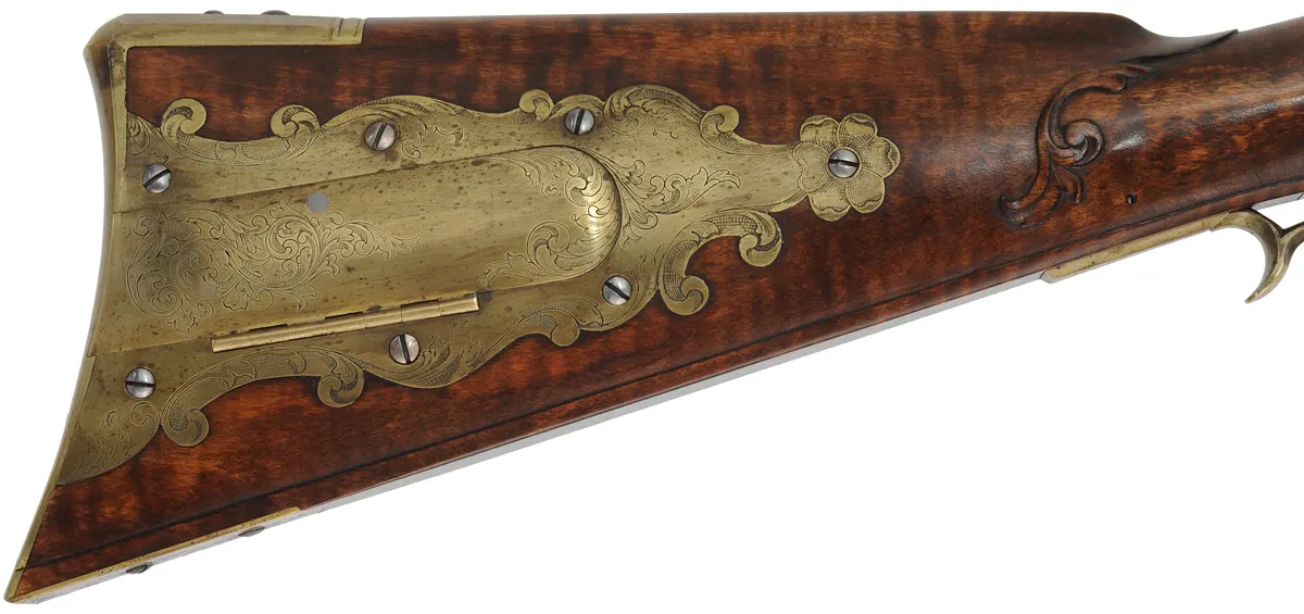 Fine Lancaster County, Pennsylvania Longrifle,
.40 caliber, 42" Green Mountain swamped barrel, 
large Siler flintlock, curly maple, brass trim,
raised carving, engraved patchbox, signed by contemporary builder R. Dietz