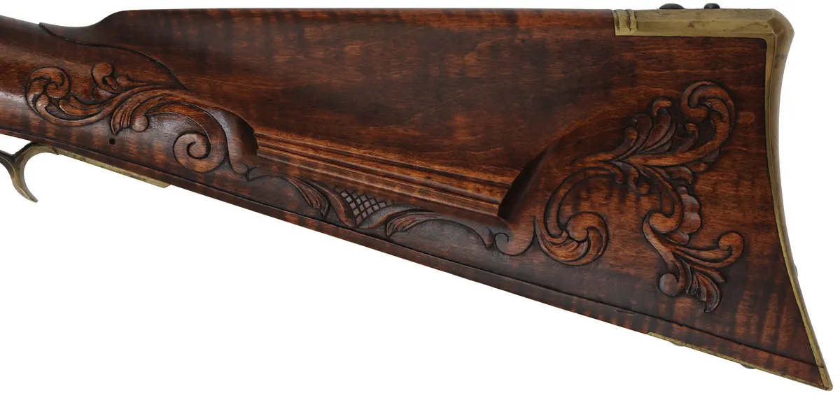 Fine Lancaster County, Pennsylvania Longrifle,
.40 caliber, 42" Green Mountain swamped barrel, 
large Siler flintlock, curly maple, brass trim,
raised carving, engraved patchbox, signed by contemporary builder R. Dietz