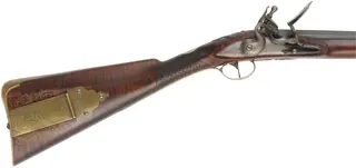 English Rifle,
.54 caliber, 38" swamped Colerain barrel,
Chambers flint lock, curly maple, engraved brass,
used, by noted gun maker Clay Smith