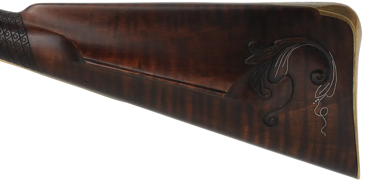 English Rifle,
.54 caliber, 38" swamped Colerain barrel,
Chambers flint lock, curly maple, engraved brass,
used, by noted gun maker Clay Smith