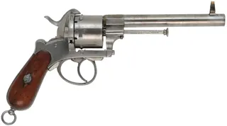 1858 System LeFauchuex Pin Fire Revolver,
caliber 11mm pin fire, 6" barrel,
walnut broom handle, Belgian proof marks, 50 cases