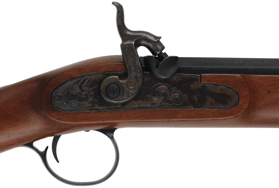 Pennsylvania Hunter Rifle,
.50 caliber,  31" octagon-to-round barrel,
percussion, walnut, iron trim, 
used, by Thompson Center Arms
