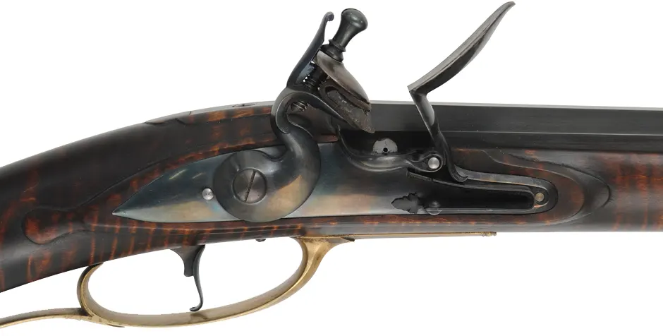 Colonial Longrifle,
.58 caliber, 43-1/2" swamped barrel, 
round faced flintlock, curly maple, unfired