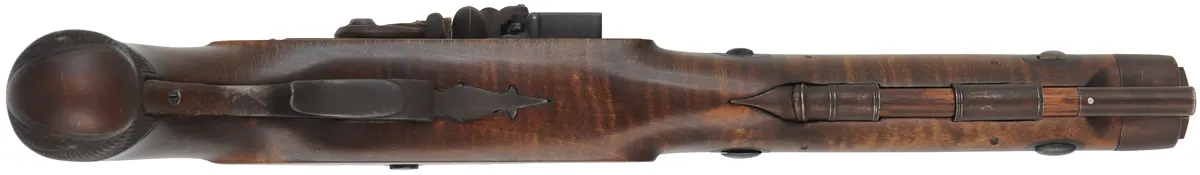 J & S Hawken Pistol,
.54 caliber, 9-3/4" barrel,
Ketland flint lock, curly maple, iron trim,
used, by John F. Bergmann