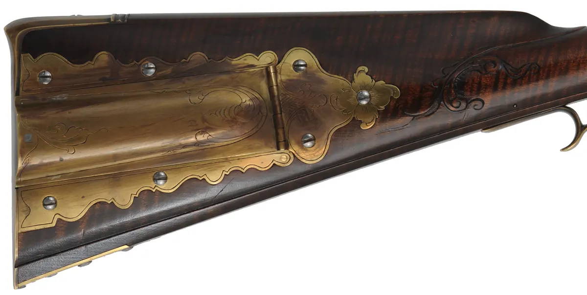 Fine Isaac Haines Longrifle, 
.50 caliber, 44" swamped octagon barrel,
Chambers flint lock, brass trim, curly maple, 
used, by J. Klein