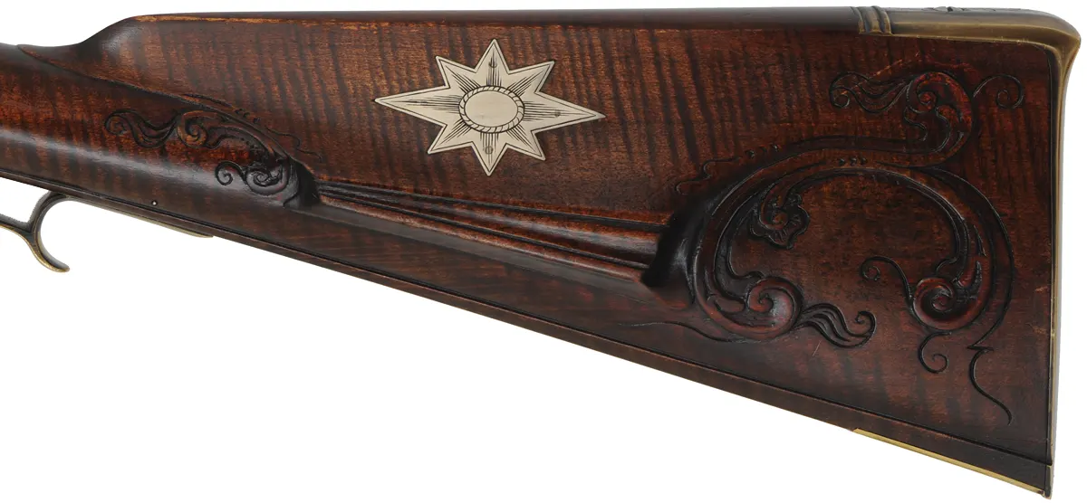 Fine Isaac Haines Longrifle, 
.50 caliber, 44" swamped octagon barrel,
Chambers flint lock, brass trim, curly maple, 
used, by J. Klein