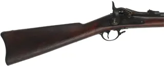 U.S. Model 1884 Springfield Trapdoor Rifle,
caliber .45-70 Gov't,  32-5/8" barrel,
walnut, iron, loose rear sight, antique