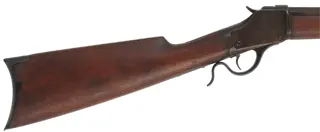 Model 1885 Winchester High Wall,
caliber .45-90 WCF, 36" barrel,
walnut, brown patina iron, 
by Winchester Repeating Arms Co.
