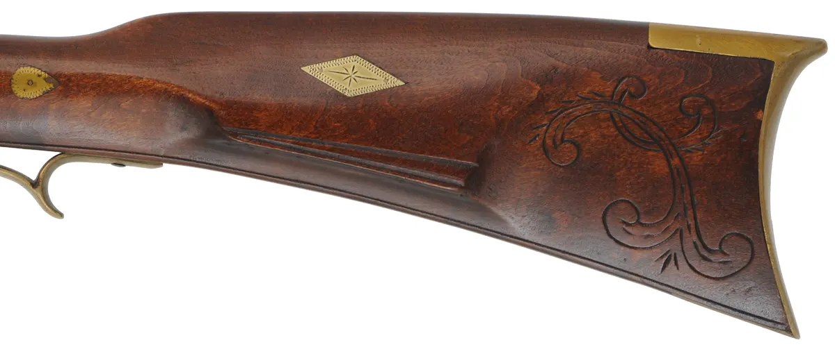 Tennessee Maid Longrifle,
.38 caliber, 41-1/4" barrel,
antique flintlock, maple, brass, extra lock,
by one of America's first replica longrifle makers,
used, signed by Royland Southgate