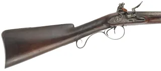 Antique English Double Shotgun,
20 gauge, 30" barrels,
reconverted flintlocks, walnut, iron, 
marked Carlisle