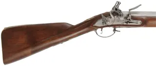 Doglock Trade Musket,
.77 caliber smoothbore, 46" octagon-to-round barrel,
flintlock, walnut, brass and iron, 
used, by Ken Brady