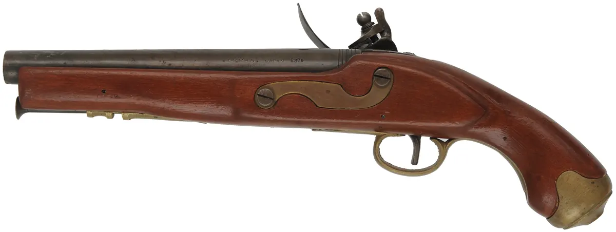 Sea Service Pistol,
.67 caliber smoothbore, 9" barrel, 
flintlock, beech, brass, 
used, made in Japan by Miroku