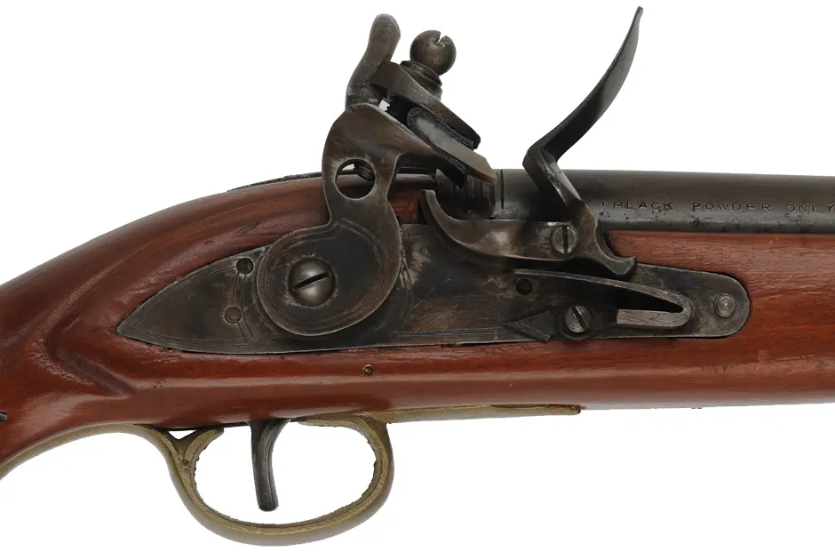 Sea Service Pistol,
.67 caliber smoothbore, 9" barrel, 
flintlock, beech, brass, 
used, made in Japan by Miroku