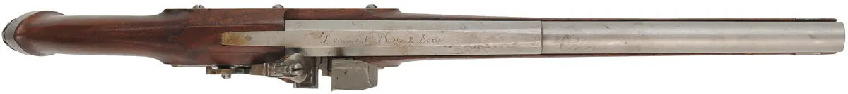 Doglock Flint Pistol,
.56 caliber smoothbore, 13-1/2" octagon-to-round barrel,
walnut, iron trim,
used, by L. Day and Sons