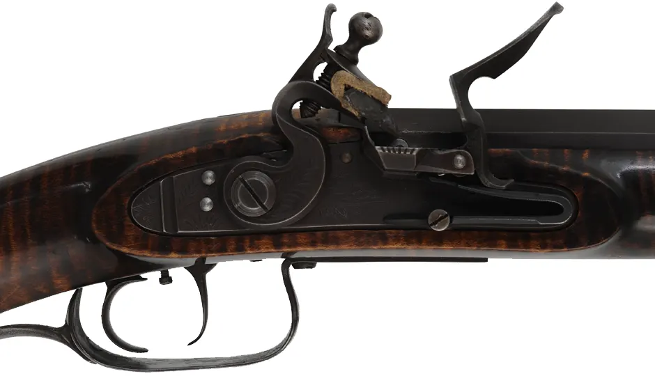Tennessee Longrifle,
.50 caliber, 42" tapered barrel,
Siler flintlock, curly maple, iron trim,
used, signed by C.O. Jossens