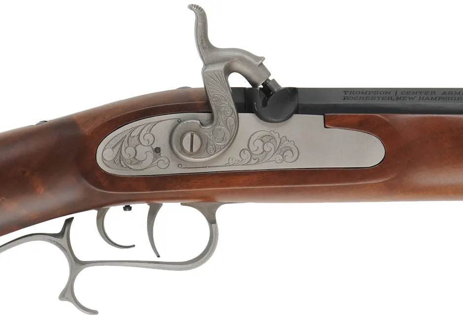 Thompson Center Hawken Cougar Rifle,
.50 caliber, 28" barrel,
percussion, fancy walnut stock, stainless steel trim,
used, by Thompson Center Arms