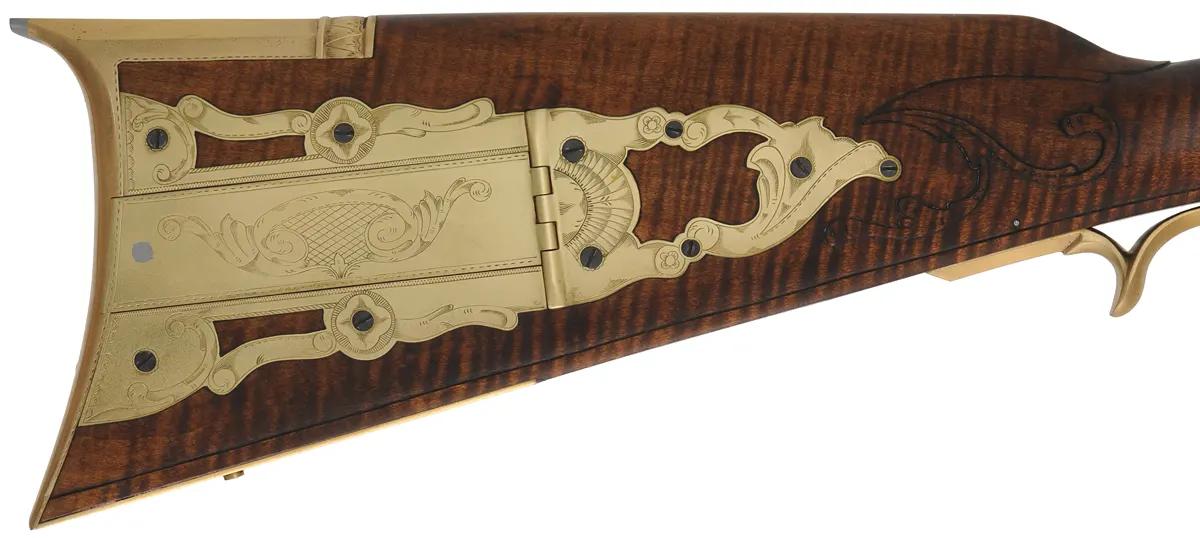 John Armstrong ~ Maryland Longrifle,
.40 caliber, 42" tapered barrel,
L&R Classic flintlock, curly maple, engraved brass, 
new, unfired, by M. Compton