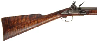 American Fowler,
16 gauge jug choked, 41" octagon-to-round barrel,
curly maple, brass, L&R Queen Anne lock, used