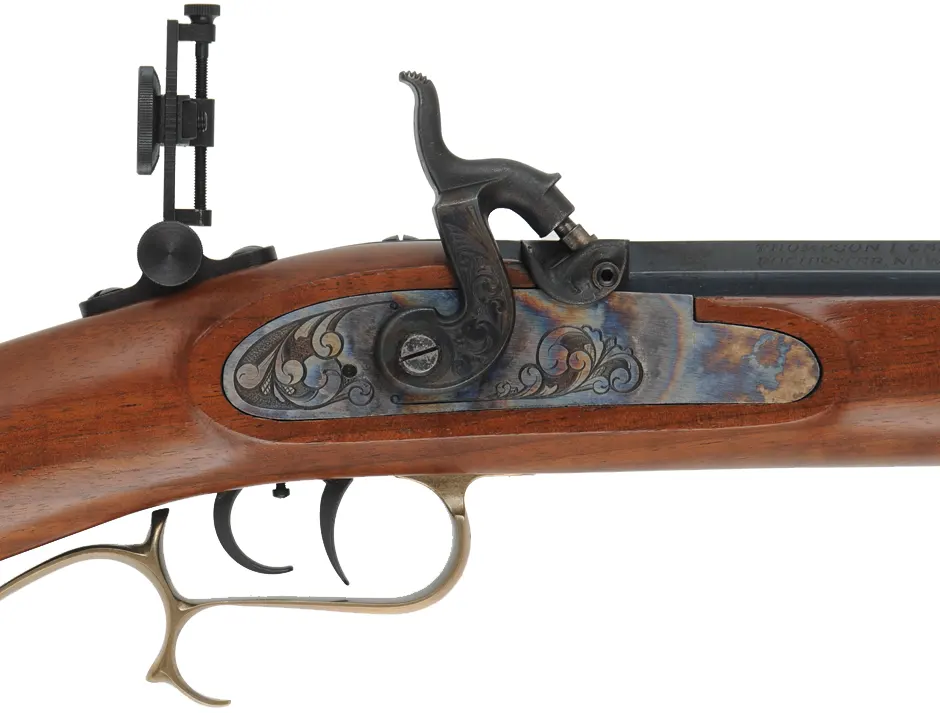 Thompson Center Hawken Rifle, 
.50 caliber, 28" barrel, 
percussion, figured walnut, brass trim, 
Vernier and globe sights, 
used, by Thompson Center Arms