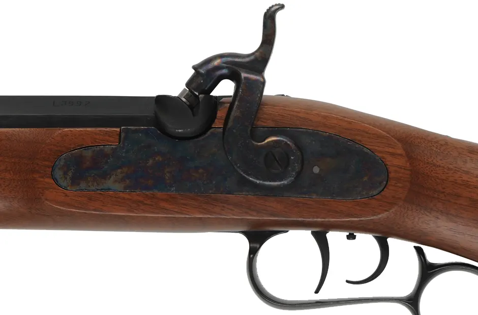 Left Hand Thompson Center Renegade,
.50 caliber, 26" barrel, 
percussion lock with no engraving, walnut, iron trim, patridge sights, 
used, by Thompson Center Arms