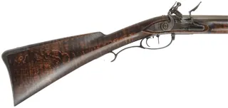 Virginia longrifle,
.54 caliber, 44" Rice swamped octagon barrel,
D. Johnson flintlock, maple, iron trim,
used, signed by L. Haarer