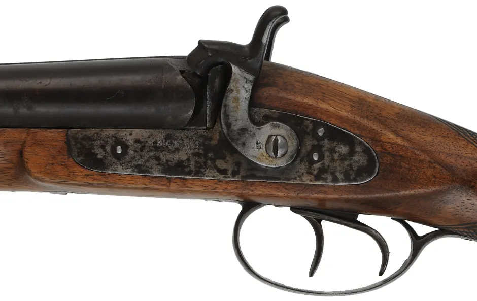 Double Barrel Shotgun,
11 gauge, 28" barrels,
front action percussion locks, pistol grip, walnut,
marked W. Richards