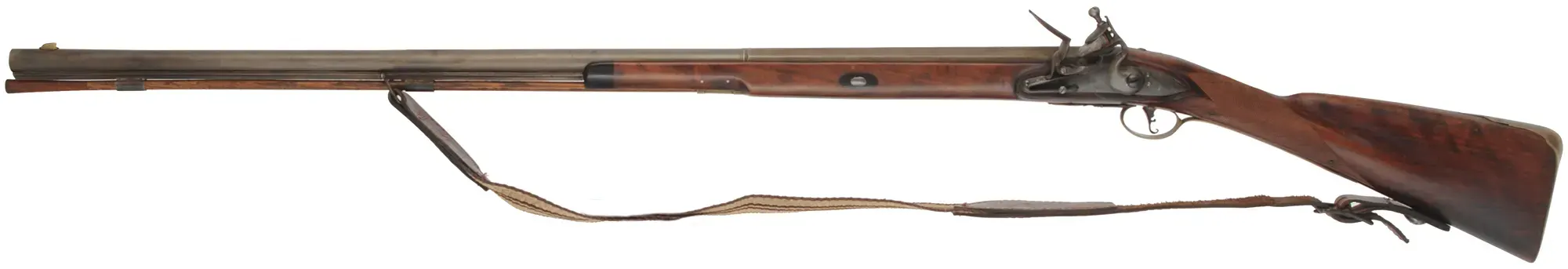 Left Hand New England Fowler, 
20 gauge turkey choke, 38" octagon to round barrel,
L&R Queen Anne flintlock, checkered cherry, brass 
used, marked B. Barrows